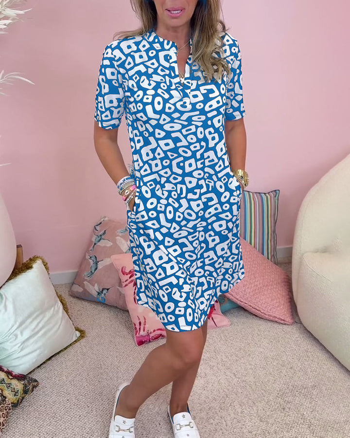 Viaro™ | Printed Dress with V-Neck and Pockets