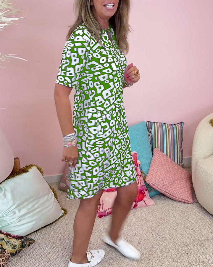 Viaro™ | Printed Dress with V-Neck and Pockets