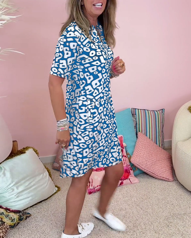 Viaro™ | Printed Dress with V-Neck and Pockets